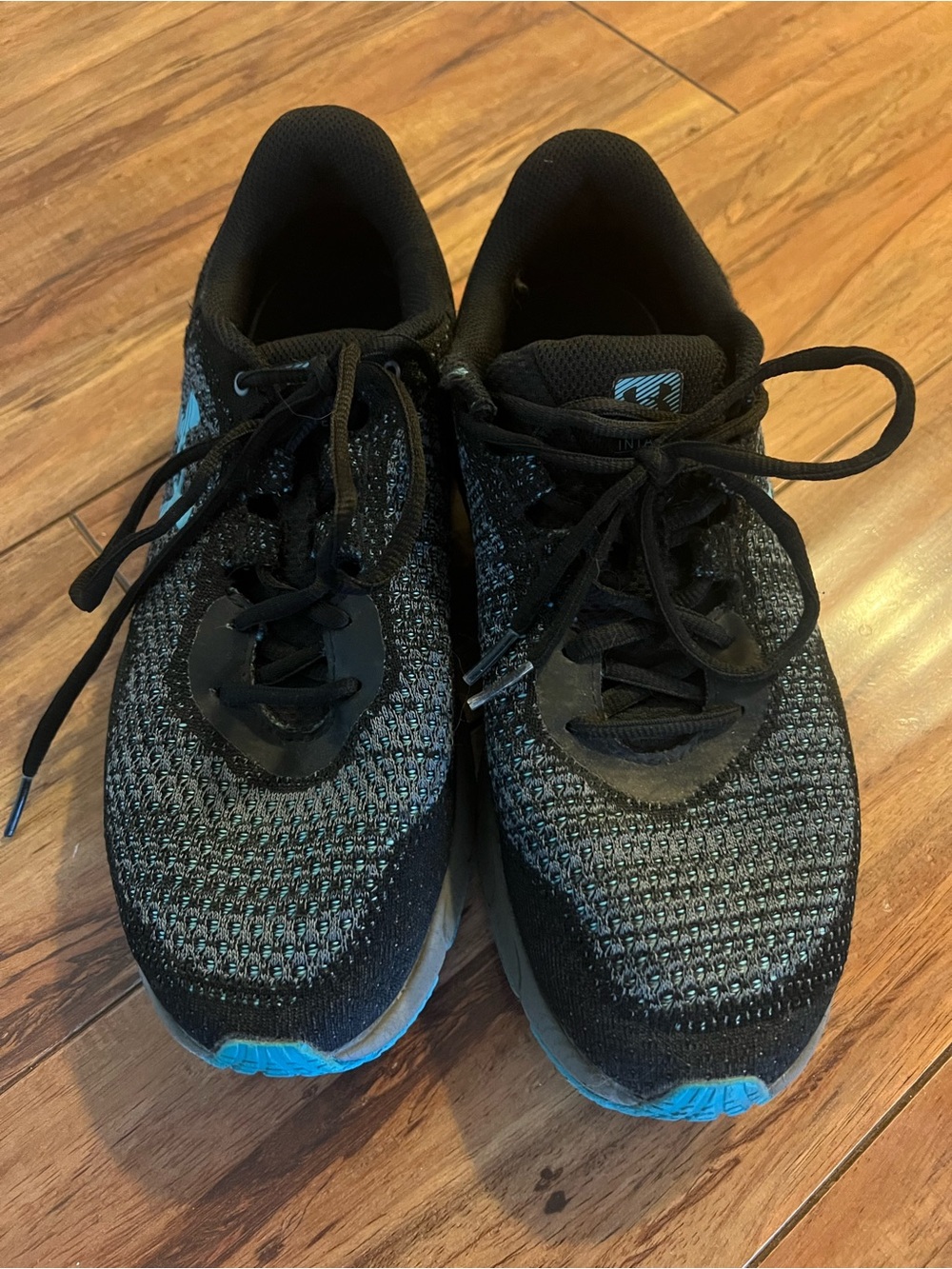 Under Armour Men's Black Athletic Shoes with Teal Accents